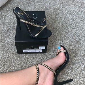 Black and gold heels